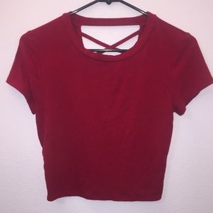 red crop top; back crossed